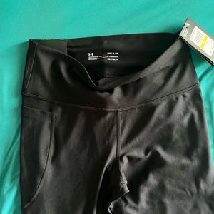 Under Armour black tights with right side pocket size M